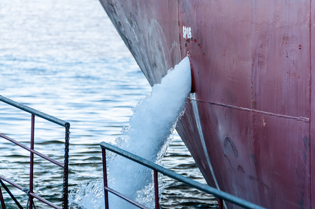 Ballast water drain from the ship close-up